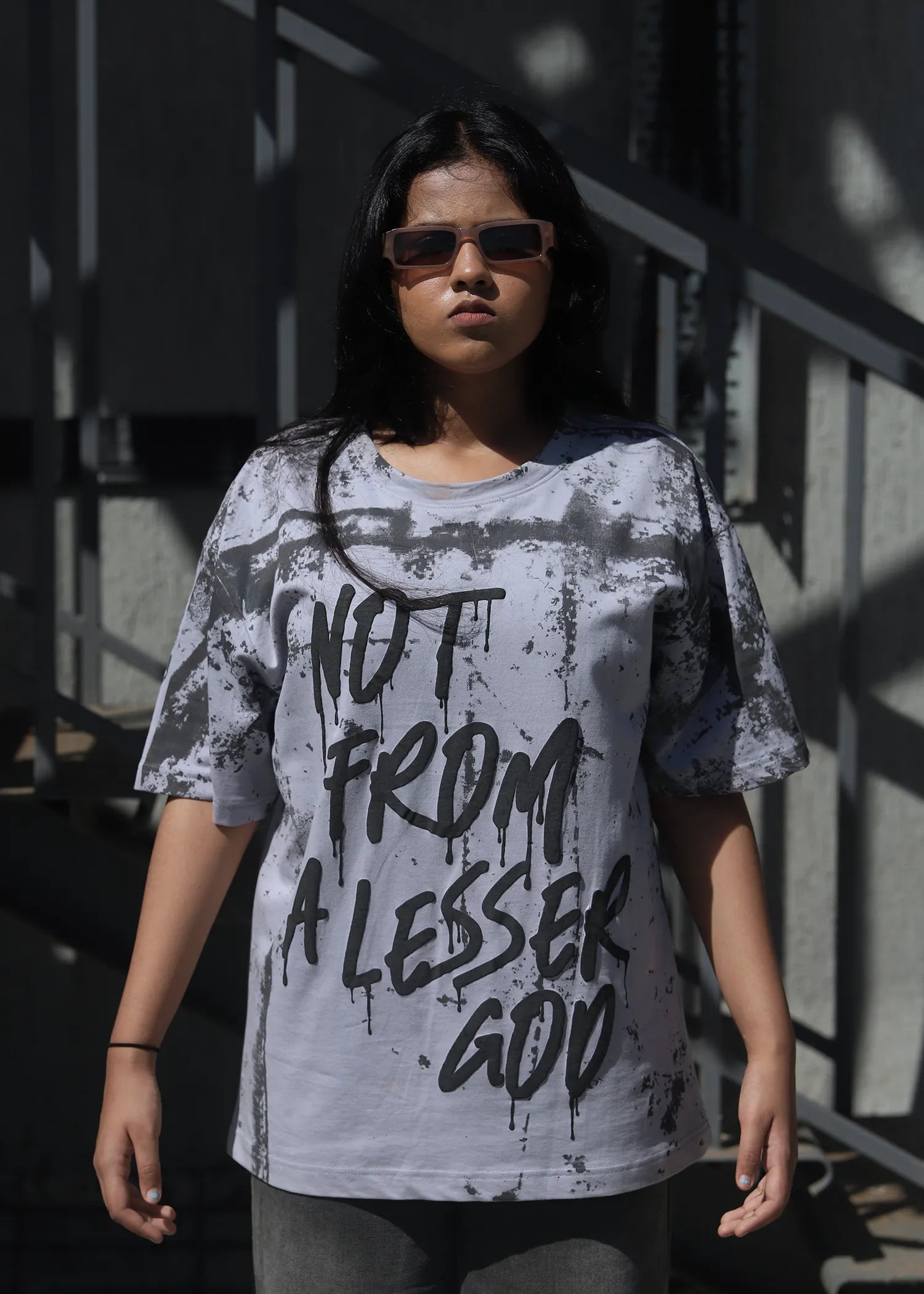 NOT FROM A LESSER GRAY GOD