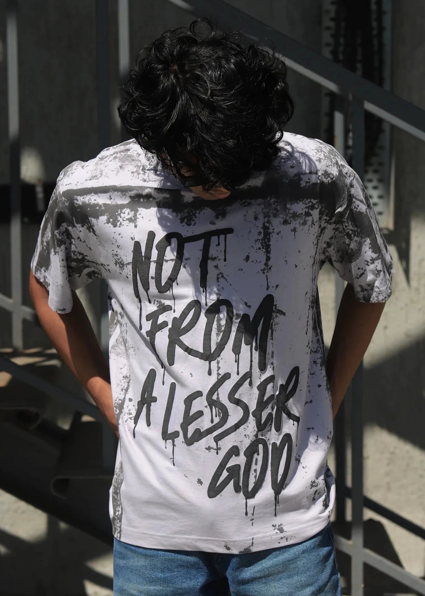 NOT FROM A LESSER GRAY GOD