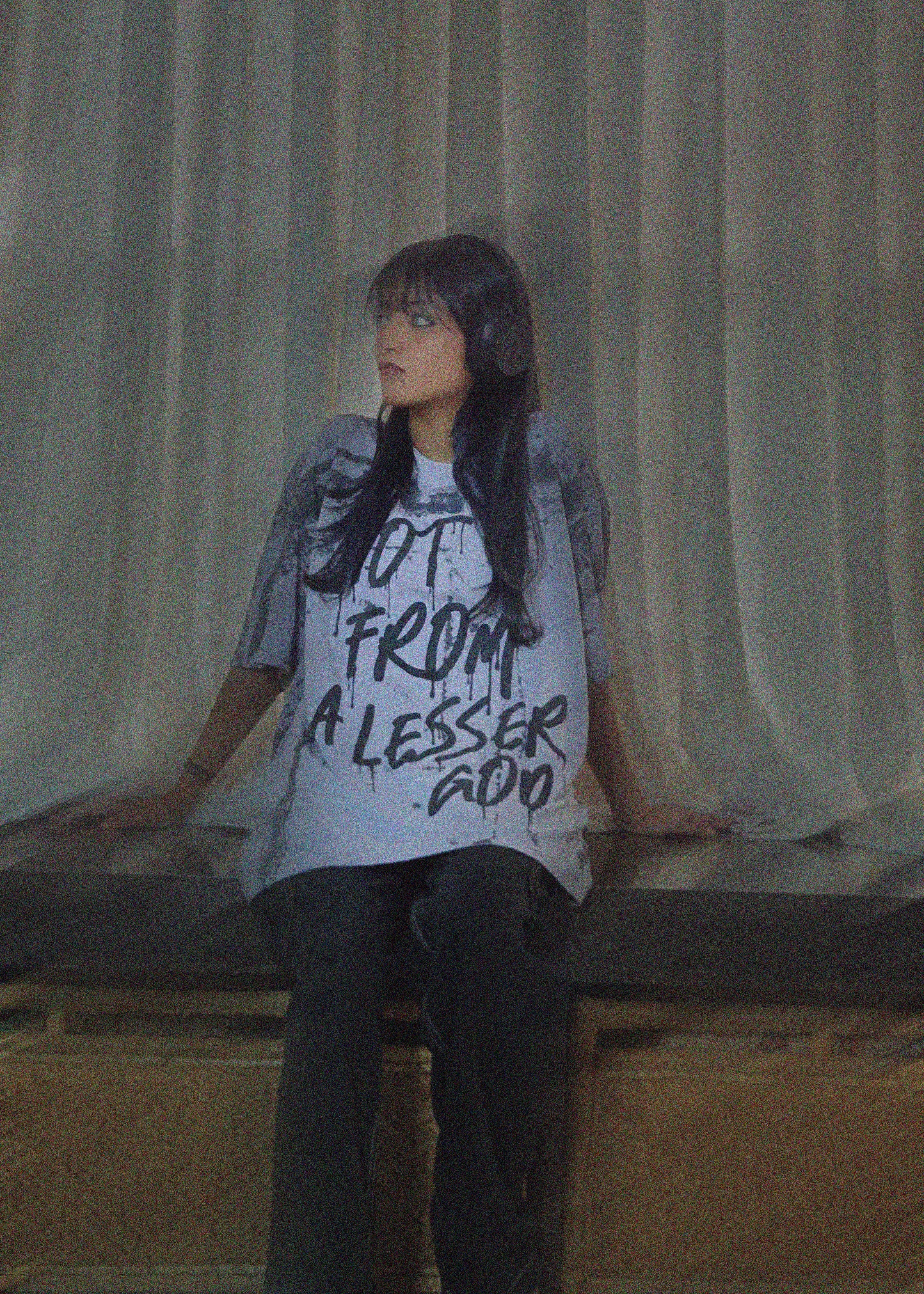 NOT FROM A LESSER GRAY GOD