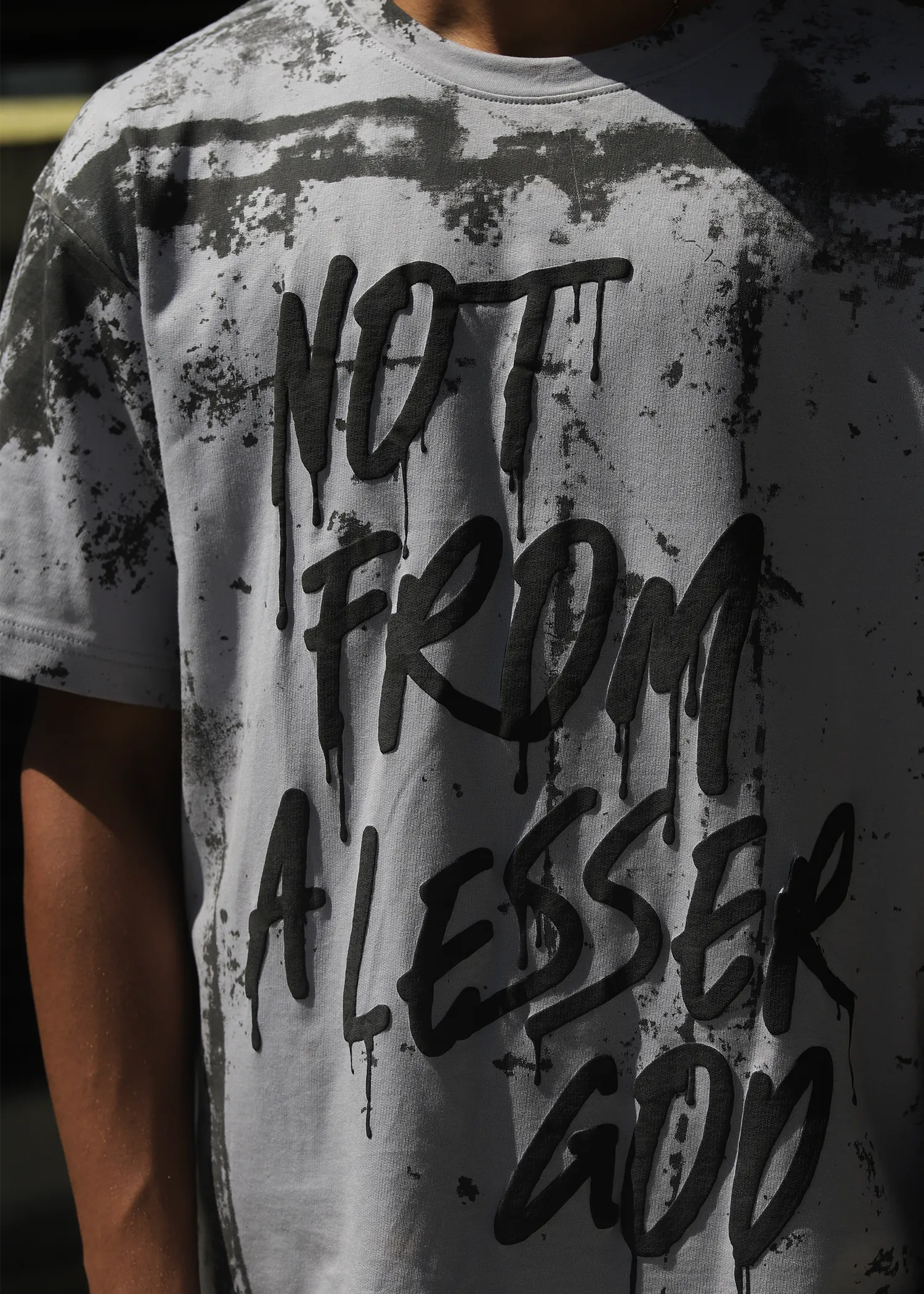 NOT FROM A LESSER GRAY GOD